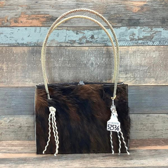 Purchase Wholesale cowhide bag. Free Returns & Net 60 Terms on Faire